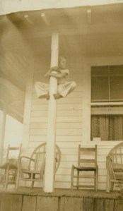 Clyde Mullins up a pole